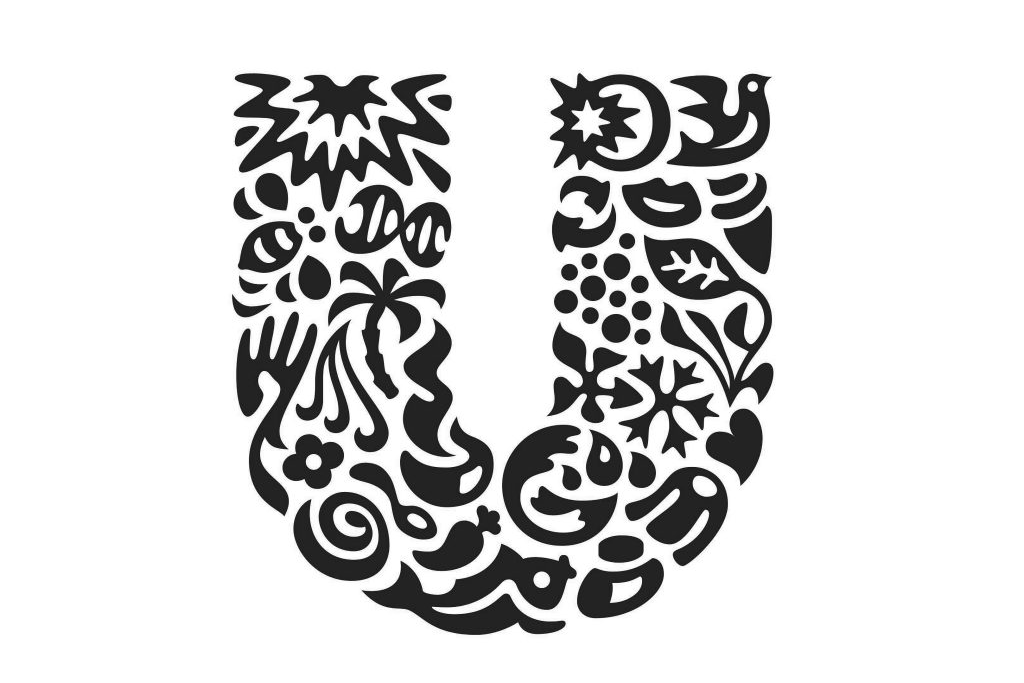 A black silhouette of the letter 'U' composed of various intricate floral and abstract shapes, creating an artistic and decorative design.
