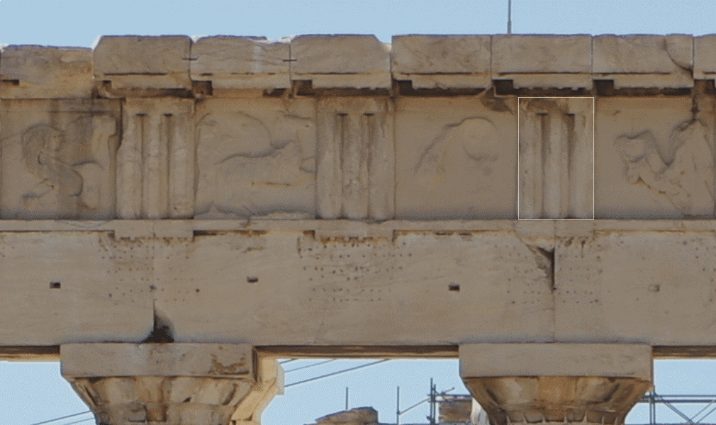 Detail of a frieze showcasing the intricate carvings and architectural elements of the Parthenon in Athens, highlighting its historical significance and artistic craftsmanship.